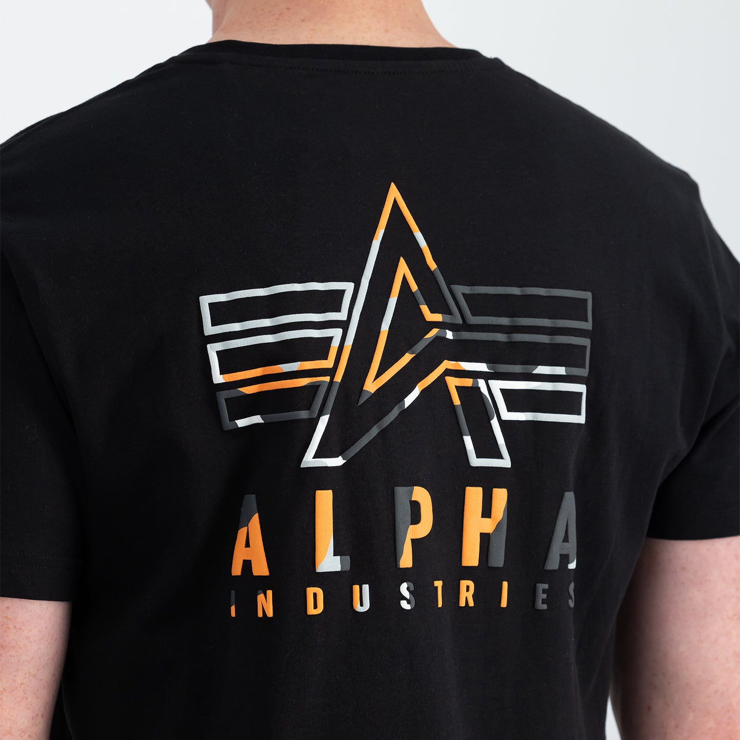 T-shirt con stampa sul retro e logo Puff