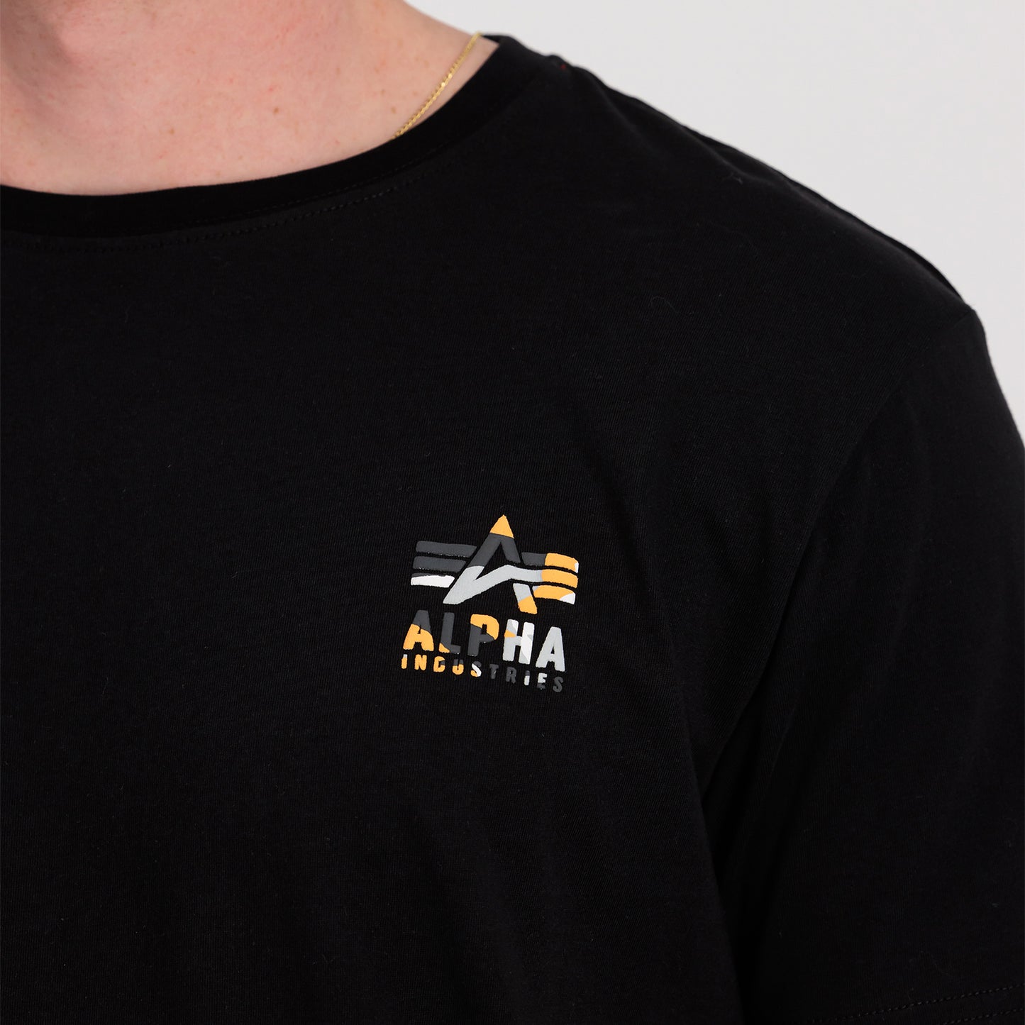 T-shirt con stampa sul retro e logo Puff